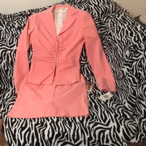 XOXO jacket and mini skirt set.